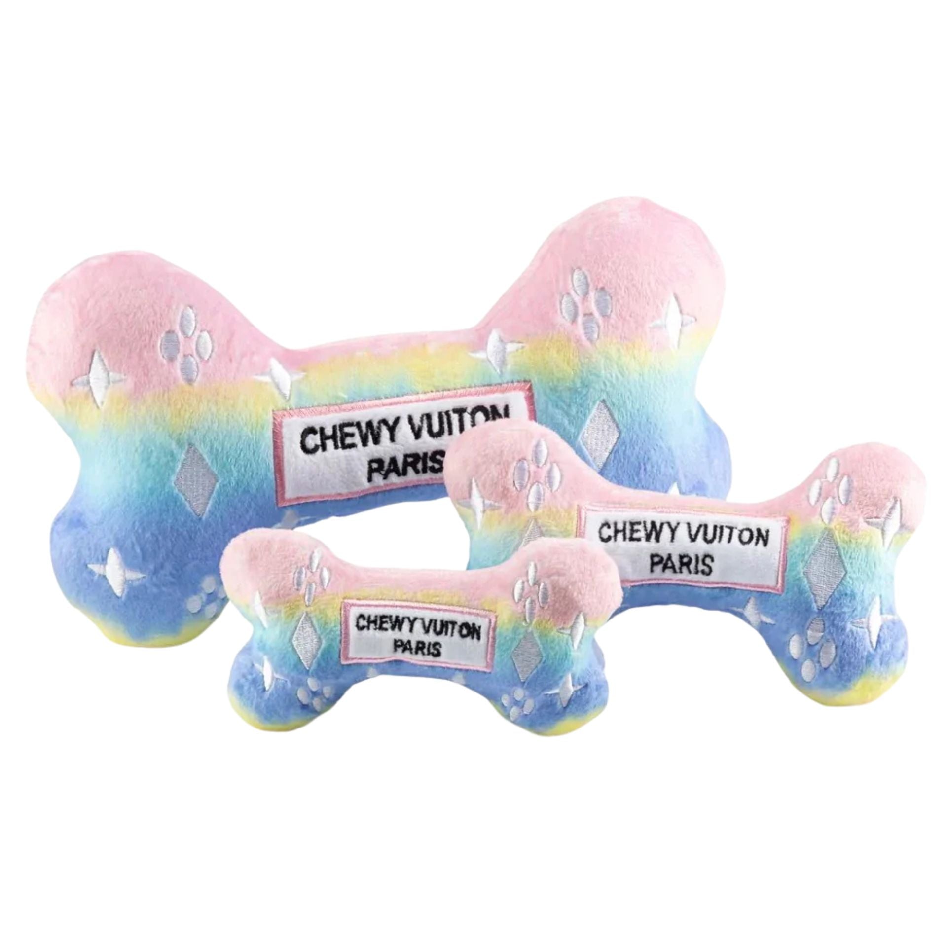 Bone-shaped dog toy with rainbow pattern and 'Chewy Vuiton Paris' label on a white background