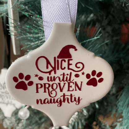 nice until naughty arabesque christmas ornament Let's Pawty Sydney